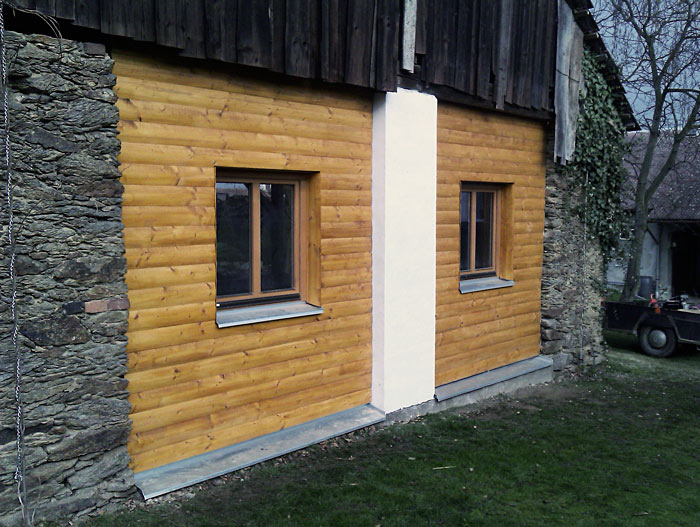 Dřevěný obklad fasády — realizace
